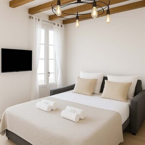 1 slaapkamer, een strijkplank/strijkijzer, reisbedje, wifi