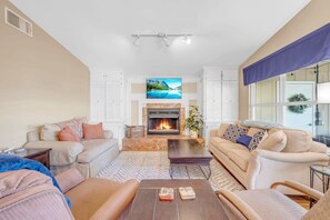 Smart TV, fireplace, DVD player, books