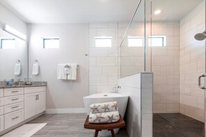 Bathtub, hair dryer, towels