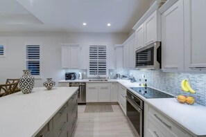 Fridge, microwave, stovetop, dishwasher - Chic 3BR Oasis by the Beach  Heated Pool (Naples)