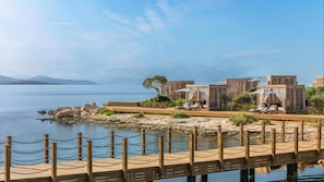 På stranden, buss til stranden (inkludert) og strandbar