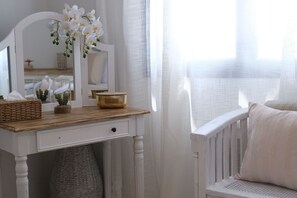 A white vanity with a wooden top, a mirror, and a small plant. - Vacation rental house with pool ARLES LS3-432 (Arles)