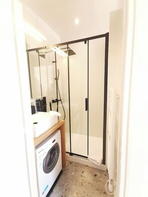 Shower, hair dryer, soap, shampoo