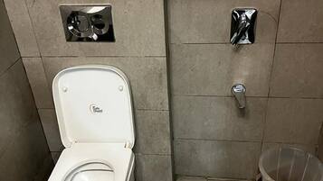 Shower, rainfall showerhead, towels, soap