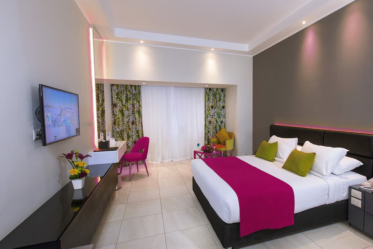 Deluxe Double Room, 1 King Bed, Pool View | 1 bedroom, free minibar, in-room safe, desk