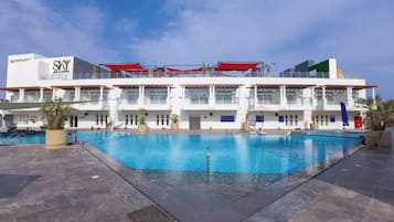 Outdoor pool, pool umbrellas, sun loungers