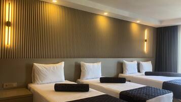 Family Room | Premium bedding, minibar, in-room safe, desk