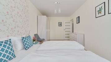 2 bedrooms, individually decorated, bed sheets