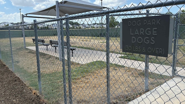 A fenced dog park with a sign indicating it is for large dogs over 30 lbs. - Preston Royal Single I Premium 1BR in Dallas (Dallas)