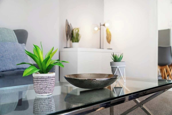 Spacious open-plan living room and a dining area, benefits from a Smart TV with Netflix and other streaming platform.