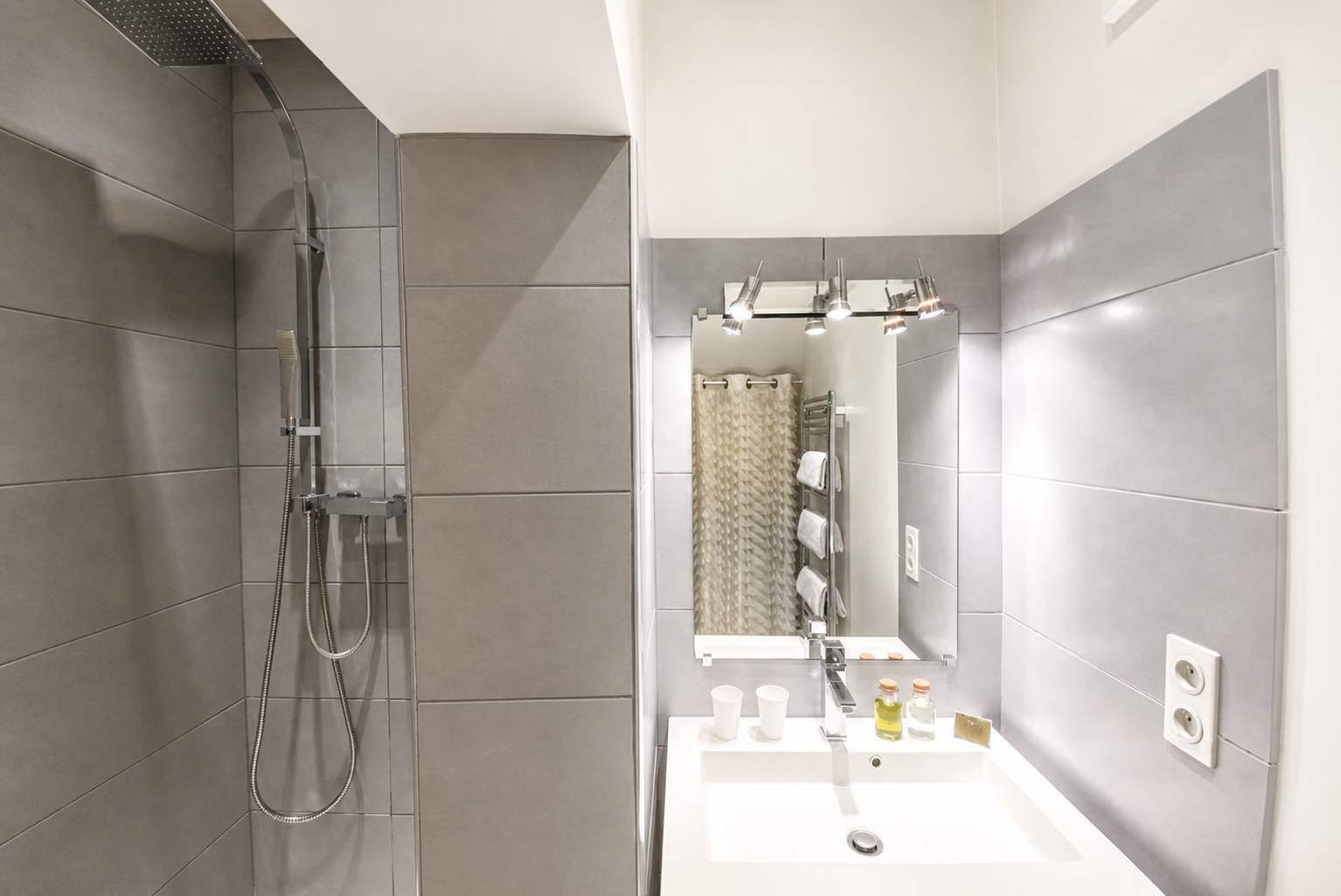 Shower, eco-friendly toiletries, hair dryer, towels