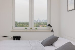 Apartment, 1 Bedroom, Balcony | 1 bedroom, bed sheets - Warsaw Apartment With a View by Renters (Warsaw)