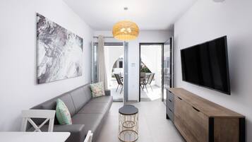 Comfort Villa | Living room | 55-inch Smart TV with digital channels, Netflix, streaming services