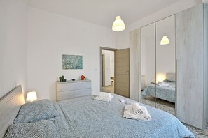 2 dormitorios, tabla de planchar con plancha, wifi gratis y ropa de cama