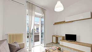 Family Apartment, 2 Bedrooms, Balcony (Casa Ojala' in the center of) | Living area - Casa Ojala' in the Center of Alberobello (Alberobello)