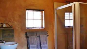 Shower, rainfall showerhead, towels