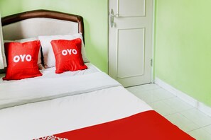 Standard Single Room | Laptop workspace, free WiFi, bed sheets - OYO 90204 Surya Inn Syariah (Cikarang)