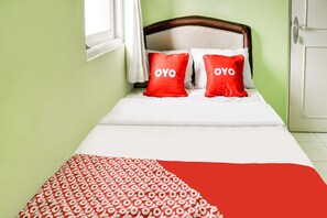 Standard Single Room | Laptop workspace, free WiFi, bed sheets - OYO 90204 Surya Inn Syariah (Cikarang)