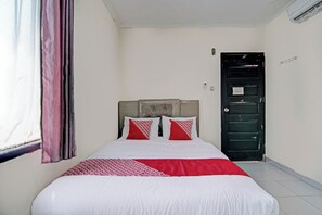 Deluxe Double Room | Bed sheets - Hotel O Rosela House Syariah (Pekanbaru)