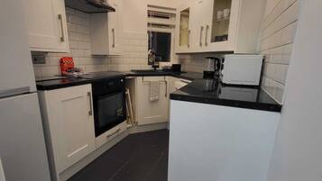 Apartment | Private kitchen | Fridge, microwave, oven, stovetop