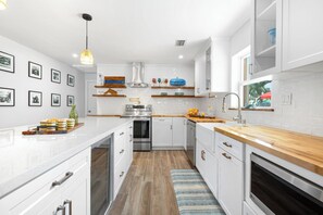 Fridge, microwave, oven, stovetop - CASA DE CANAL ~ Beautiful Renovated 3 BR, 2 Bath Canal Front Home w/Dockage! (Key West)