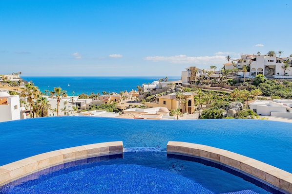 Jacuzzi and infinity pool with incredible ocean view