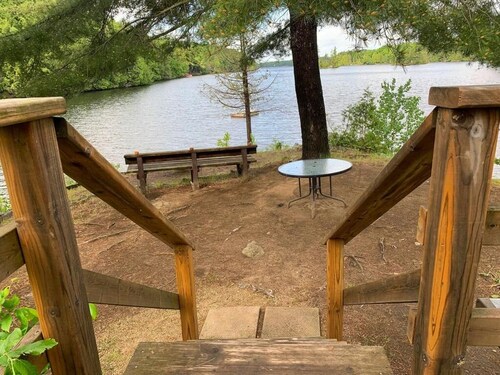 Cozy cabin with a lake front view. 