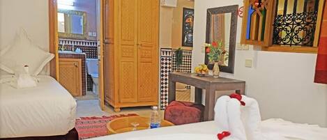 Family Room | 1 bedroom, premium bedding, minibar, in-room safe