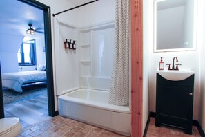 Shower, jetted tub, hair dryer, towels