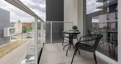 Studio Near Manufaktura Łódź by Renters