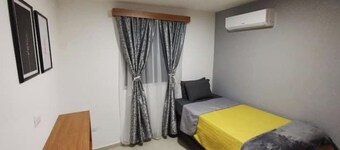 Bonita y Cómoda Casa a Minutos del Aeropuerto