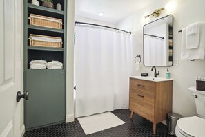 Hair dryer, towels, soap, shampoo