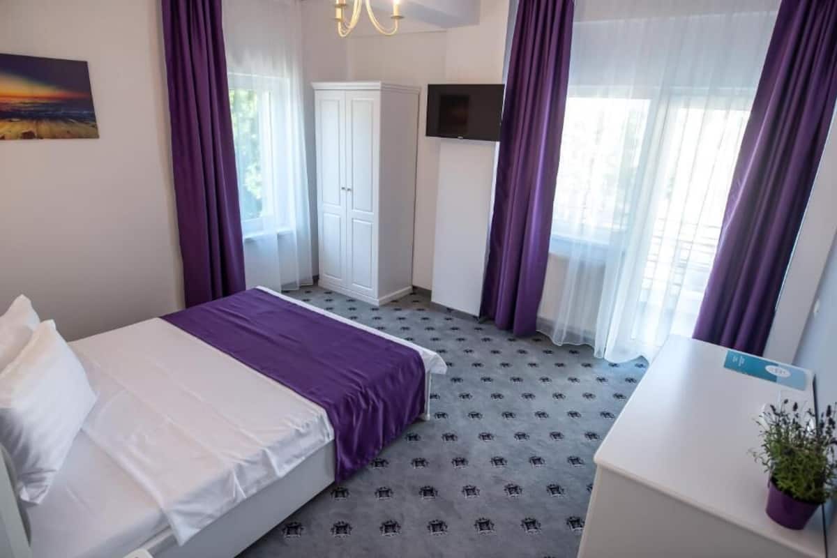 Quarto casal superior | 1 quarto, Wi-Fi de cortesia, roupa de cama
