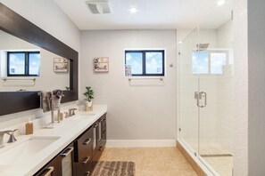 Shower, hair dryer, towels, soap