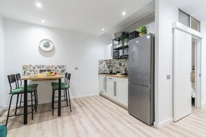 Microwave, stovetop, coffee/tea maker, electric kettle