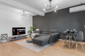 Apartamento empresarial | Área de estar | Smart TV