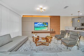 Family House | Living area | LCD TV - Storey Lake 9 BR Themed Games Room (Kissimmee)