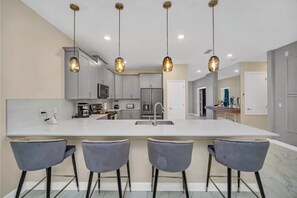 Family House | Living area | LCD TV - Storey Lake 9 BR Themed Games Room (Kissimmee)