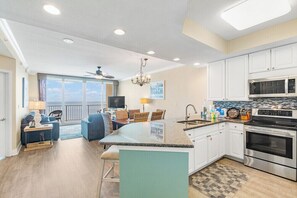 Coffee/tea maker, fridge, microwave, oven