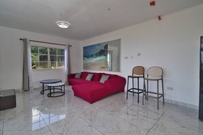 Smart TV - Creole Cottage 2BR Apartment is a fully furnished located in Anse Royal with AC (victoria)