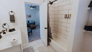 Shower, hair dryer, towels