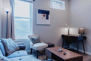 TV, fireplace, offices - Spacious 2-BR First-Floor Soulard Apt—Desk, Smart-Lock, Free Parking (St. Louis)