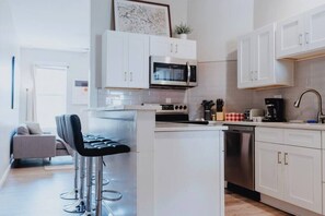 Fridge, microwave, oven, stovetop - Spacious 2-BR First-Floor Soulard Apt—Desk, Smart-Lock, Free Parking (St. Louis)