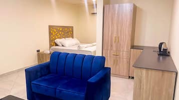 Deluxe Suite | Living area | Smart TV