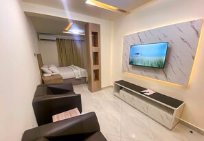 Deluxe Suite | Living area | Smart TV - 12th Legacy Hotel (Lagos)