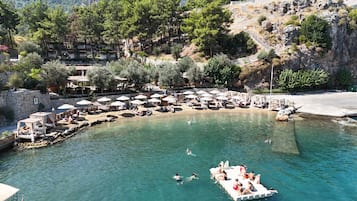 Private beach, rowing