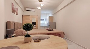 1 habitación, tabla de planchar con plancha, wifi y ropa de cama 