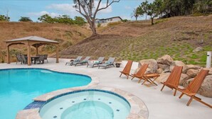 A swimming pool with lounge chairs and a gazebo. - Fallbrook's Finest Hideaway Casa - Pool, Game Rm (Fallbrook)