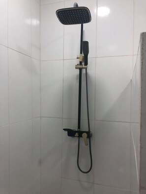 Shower, towels, soap, toilet paper - Beautiful Apartment, located on the public road seawall full kitchen included AC (Georgetown)