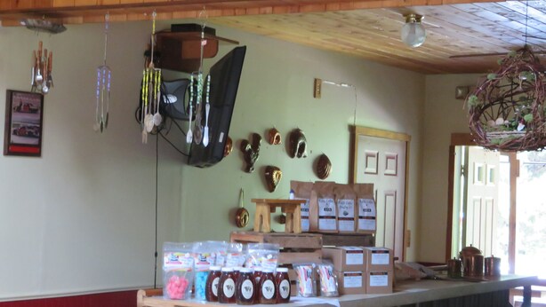 A gift shop with various items on display including jars, boxes, and hanging decorations. - Just 15 minutes from Ricketts Glen State Park, Restaurant and Bed & Breakfast  (Benton)